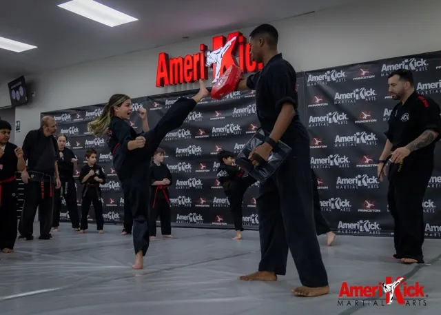 AmeriKick Princeton student practicing a high kick