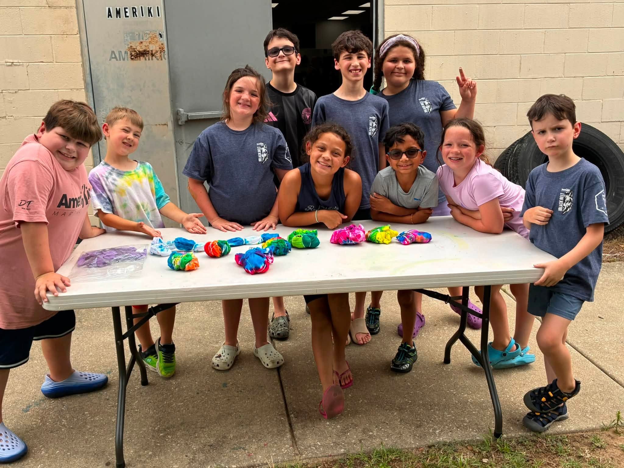 AmeriKick Marlton campers enjoying a group craft activity